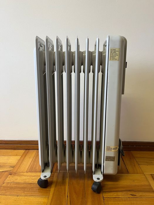 Aquecedor a óleo marca solar 1500w