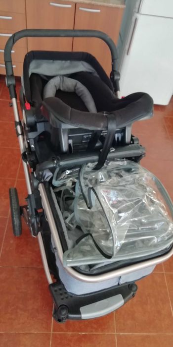 Carro com cadeira e alcofa