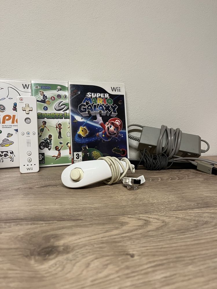 Nintendo wii com comando e 3 jogos originais