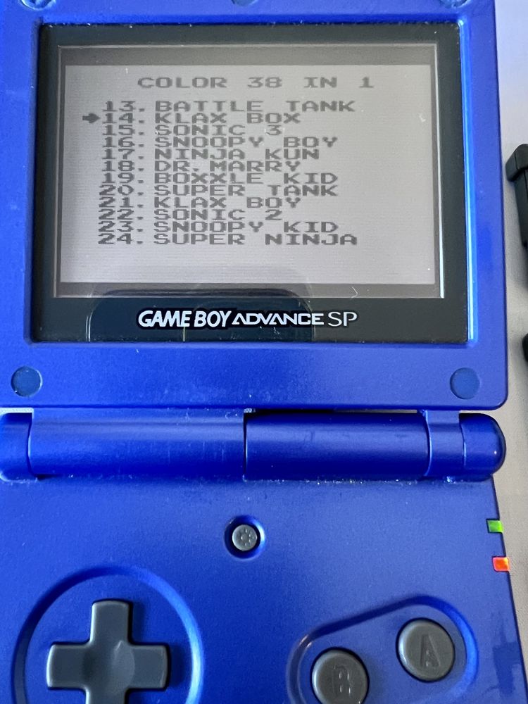 Gameboy advance sp azul com carregador e 4 jogos
