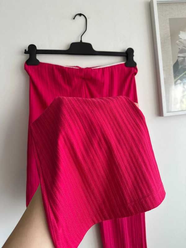 Legginsy dzwony flare L Reserved w prążek różowe na gumce wysoki stan