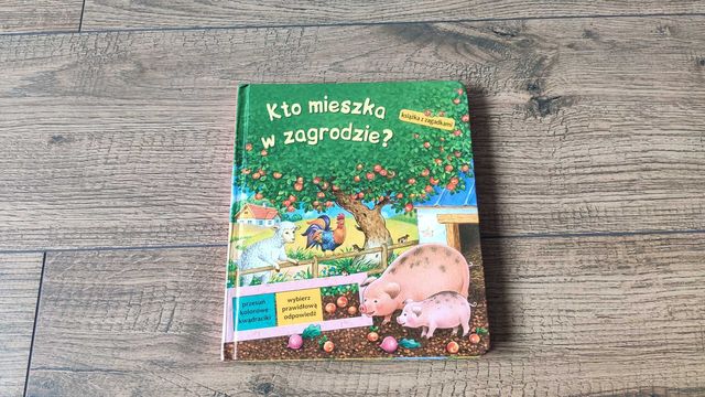 Książka Kto mieszka w zagrodzie / książka z zagadkami i okienkami