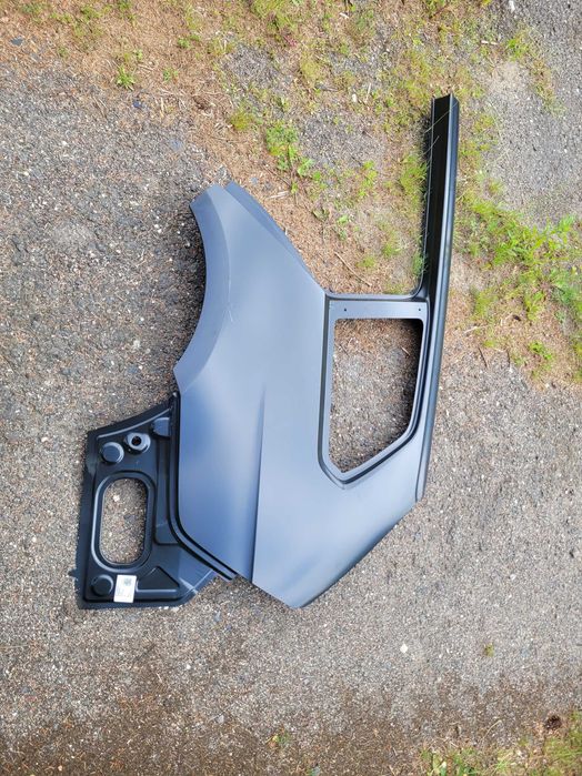 Błotnik lewy tył VW Golf VII kombi