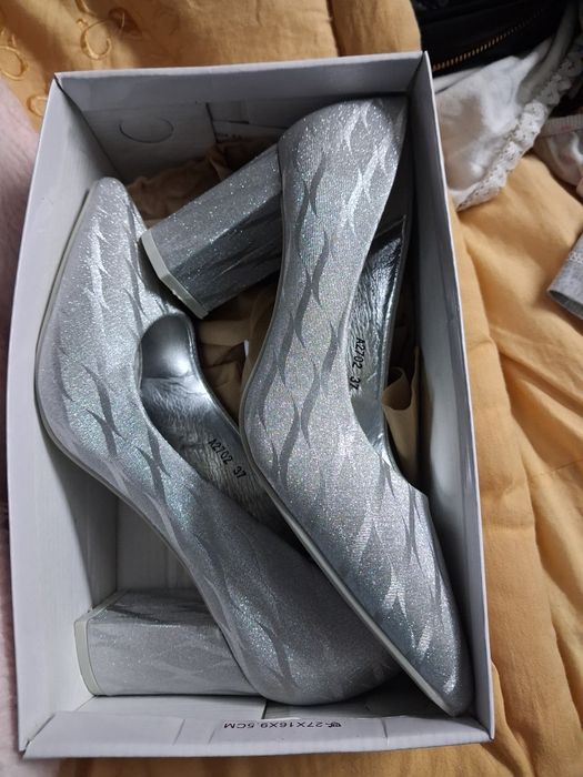 Sapatos de salto Alto