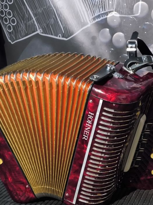 Concertina hohner está em fã lá ré