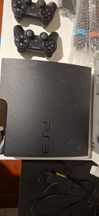 PS3 Slim 320 GB + 2 comandos + 2 microfones + 12 jogos + caixa e manua