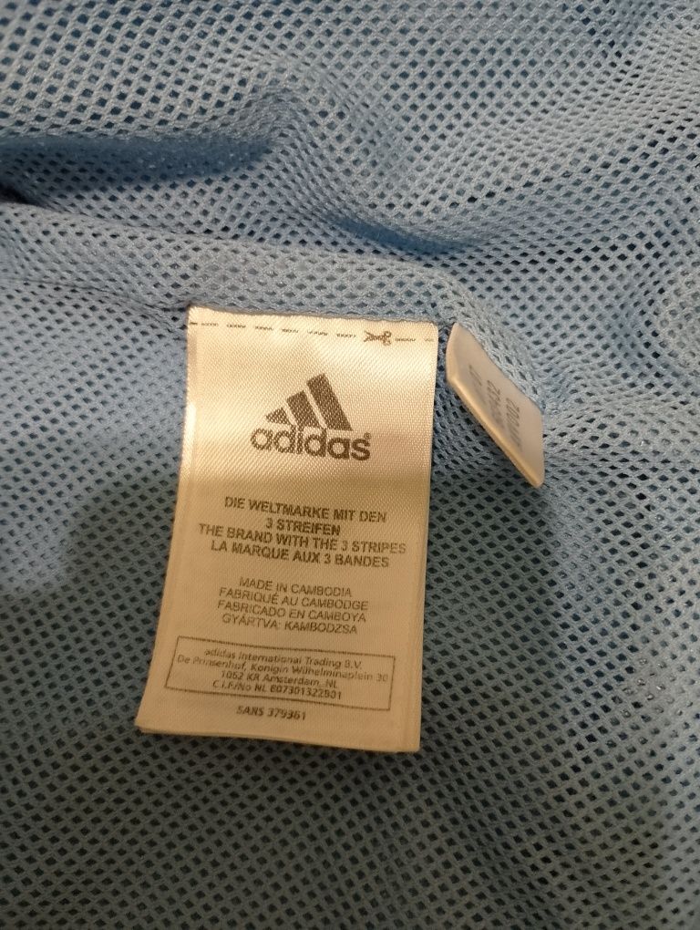Куртка Adidas блакитного кольору. Розмір S.