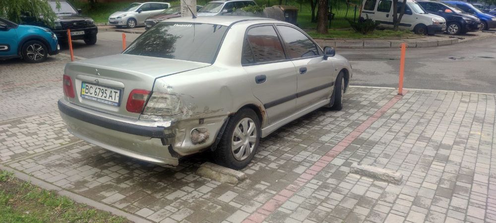 Mitsubishi carizma 2002 Міцубісі кврізма