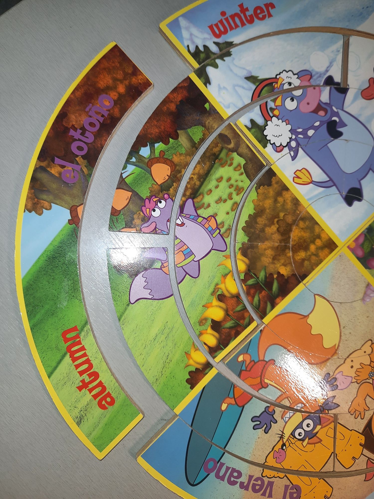 Drewniane dwustronne puzzle Dora poznaje świat