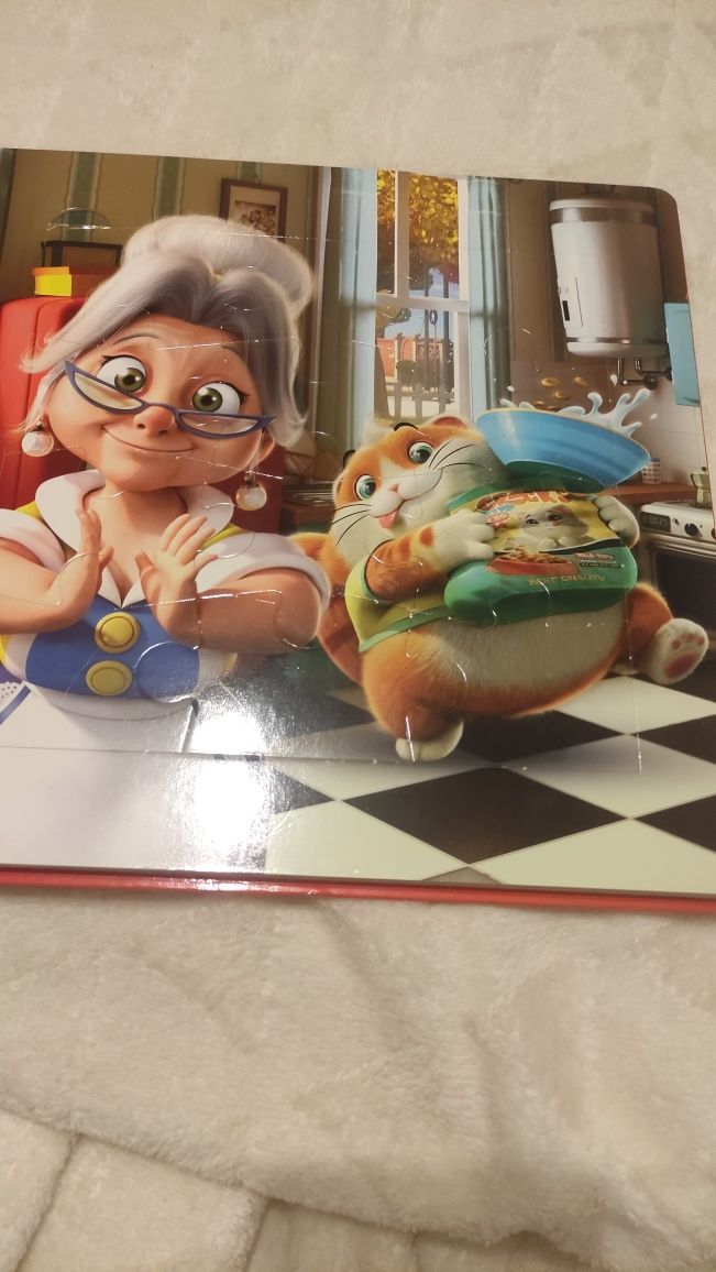Książka 44 koty z puzzlami