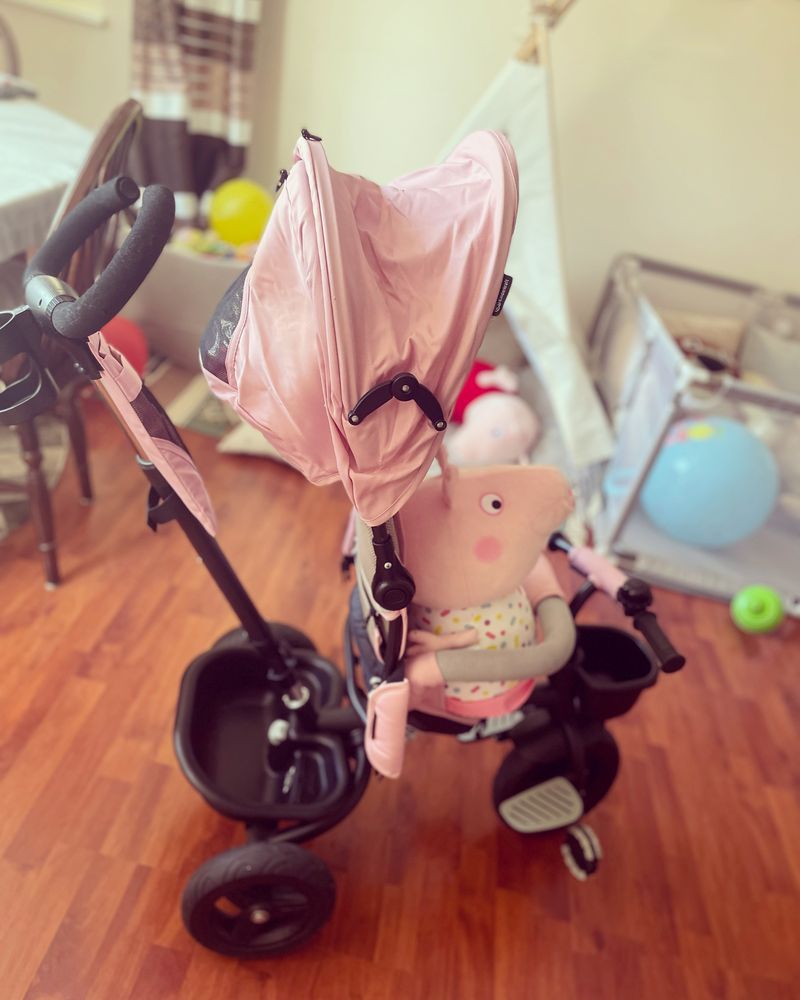 Piękny różowy wózek-rower niemowlęcy, nowy