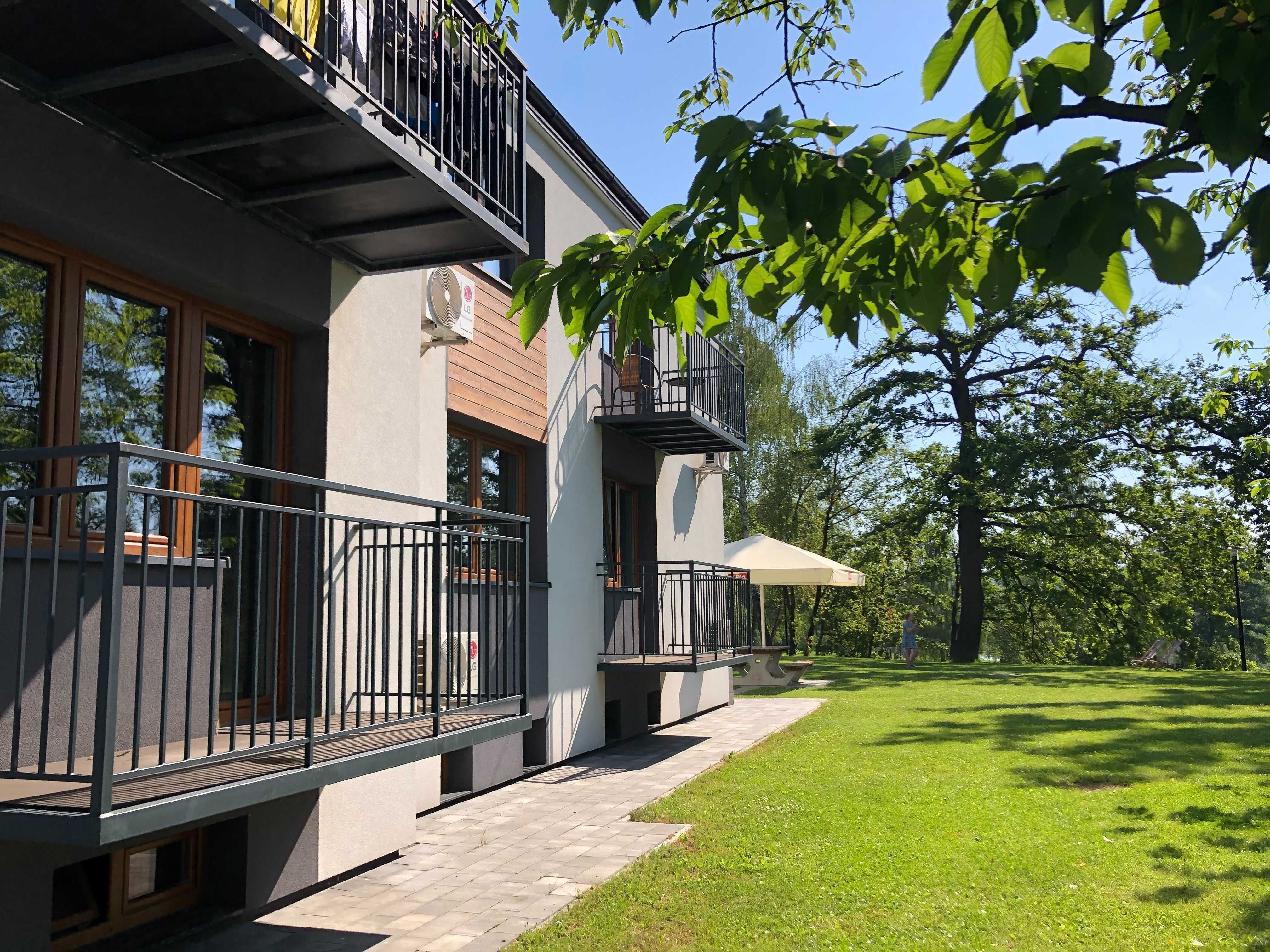 nocleg Zator Energylandia apartament pokoje nad łowiskiem nad wodą