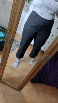 Spodnie damskie rozmiar 44 z szeroką nogawka