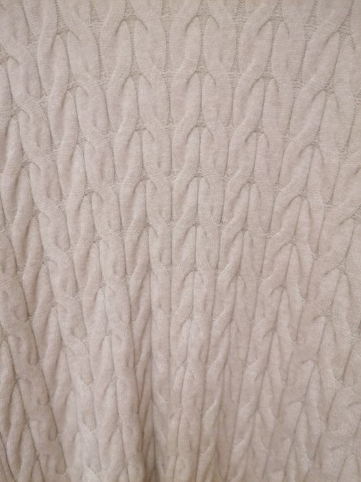 Casaco de malha entrançado