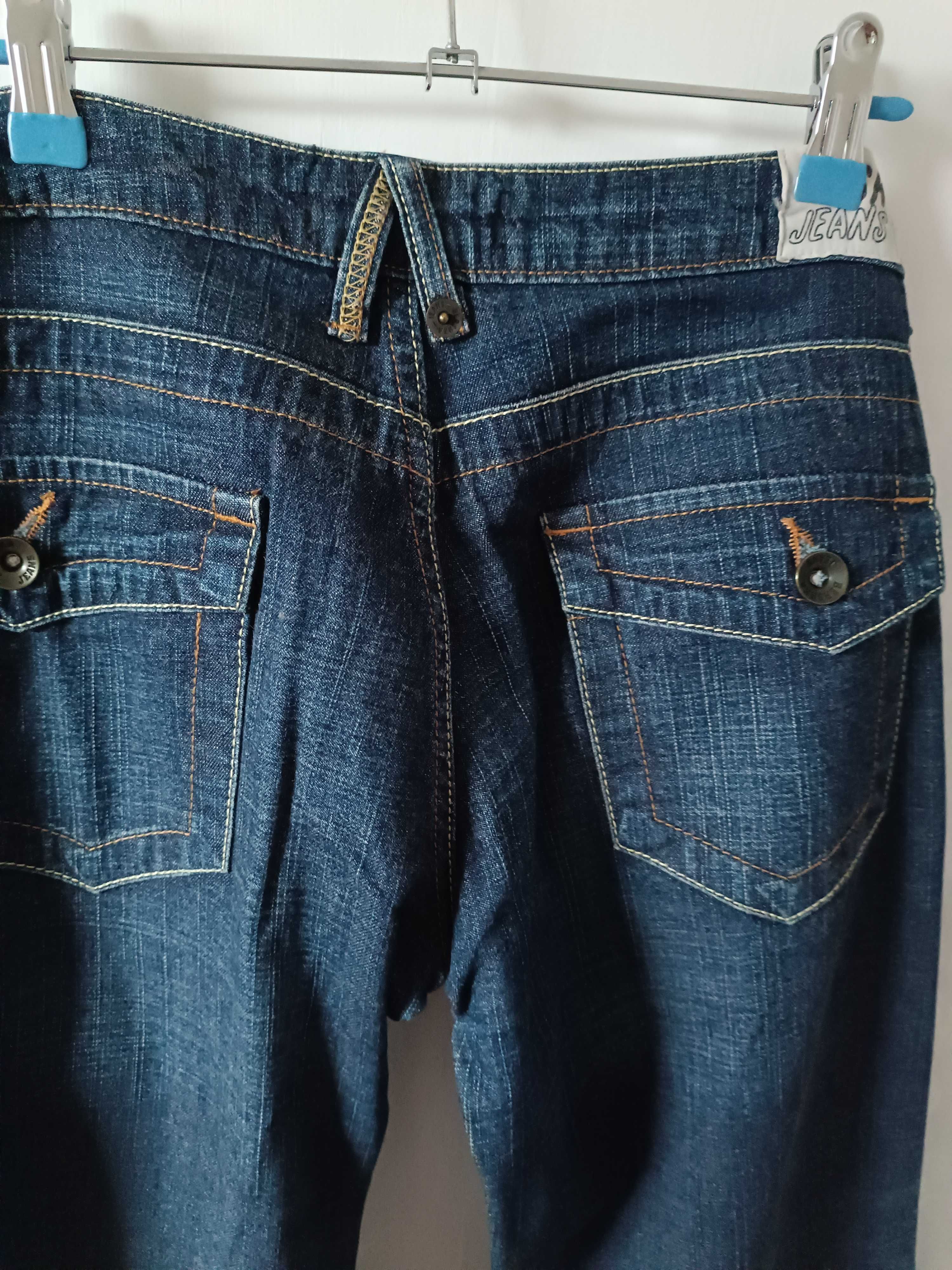 calça de ganga de marca