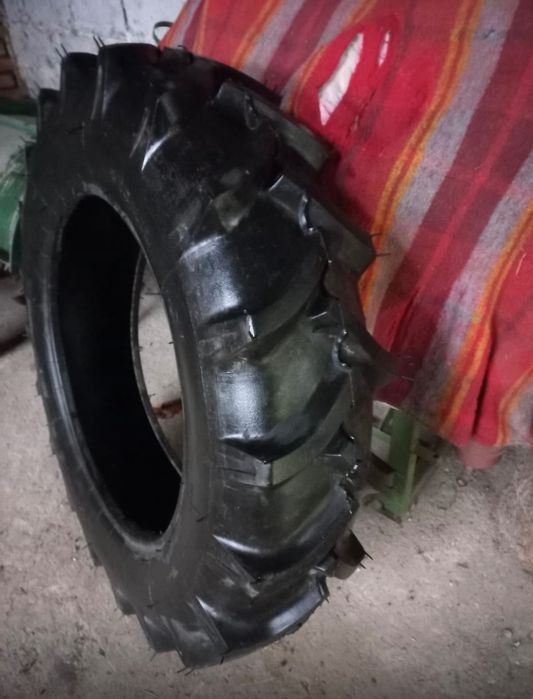 Opona Stomil Olsztyn NOWA do c-330, rozmiar 12.4/11-28