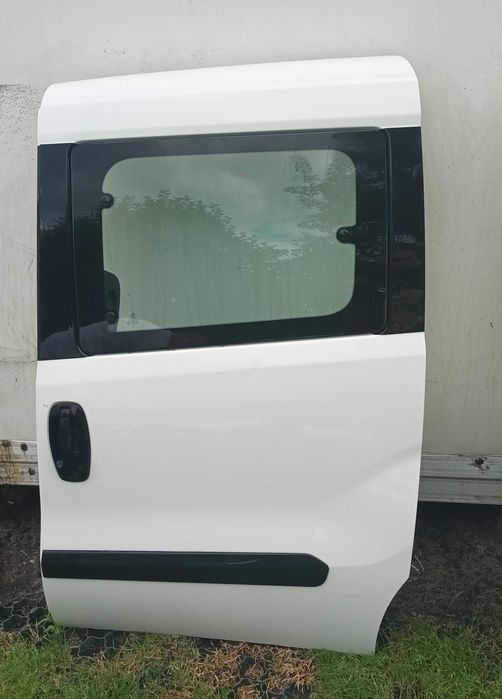 Drzwi lewy tył lewe boczne fiat doblo II lift 2015-