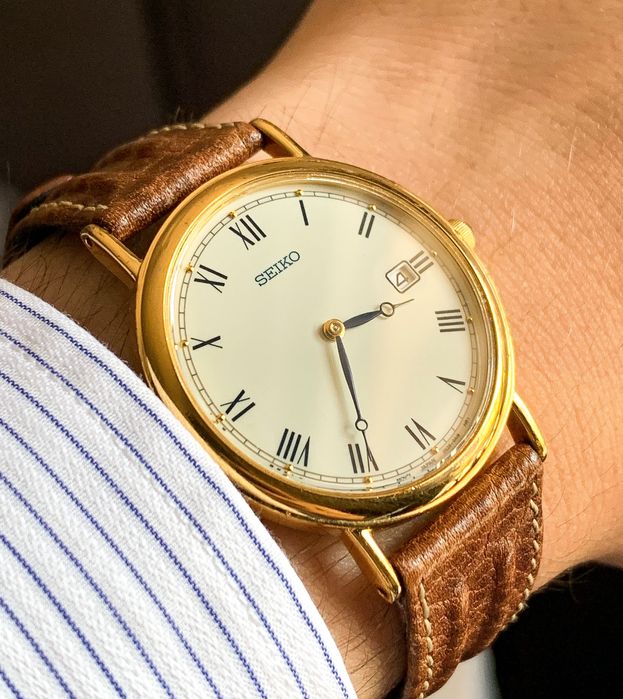 Zegarek Seiko kwarcowy, złoty do garnituru