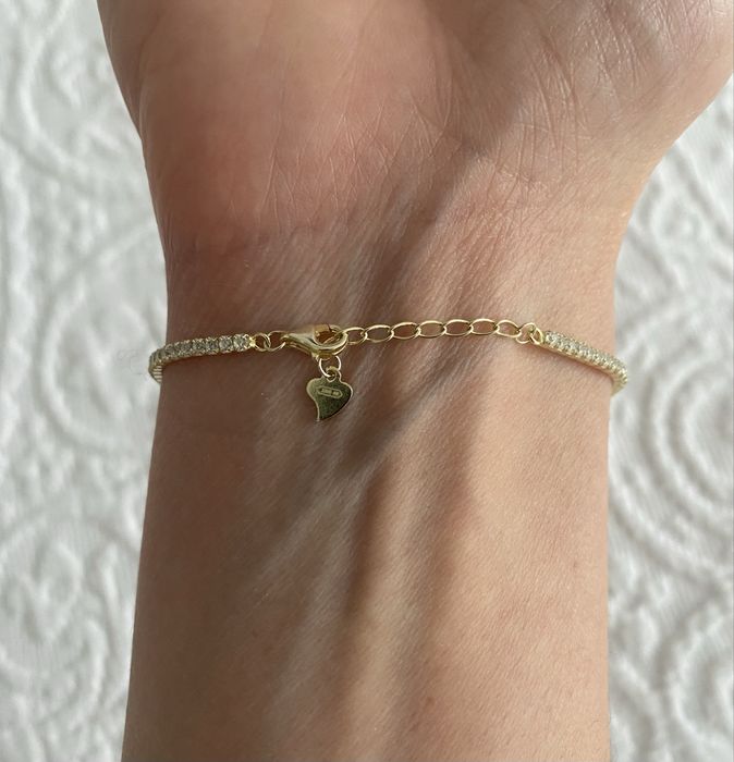 Pulseira prata dourada com zirconias. Novo