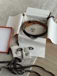 Czarny pasek Hermes Kelly 18 ze srebrnym okuciem one size nowy