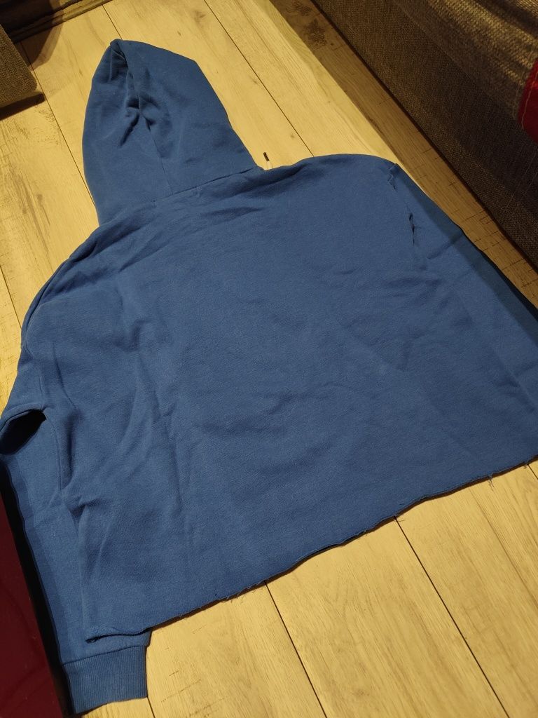 Bluza bawełniana z dużym kapturem z napisem Noisy lekko oversize