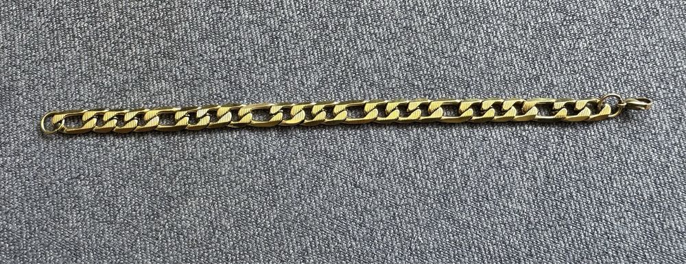 Bransoleta - męska kolor złota - figaro wzór - polecam !!!
