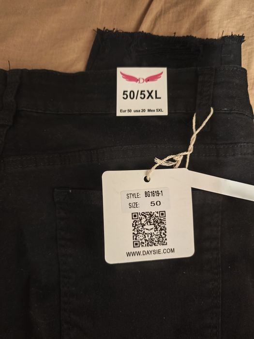 Spodnie jeans r50 z dziurami