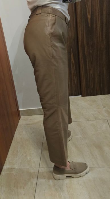 Beżowe spodnie Ochnik skórzane skóra