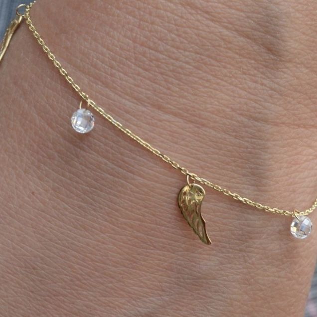 Złota bransoletka celebrytka 333 skrzydełka z białym kryształem