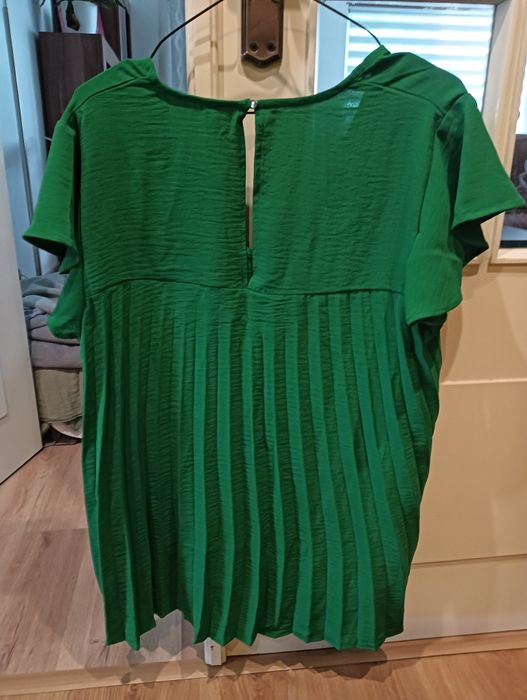 Túnica ainda com etiqueta