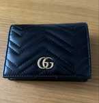 Кошелек Gucci.