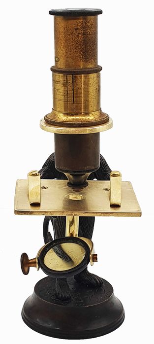 Brass reproduction of a “monkey microscope”