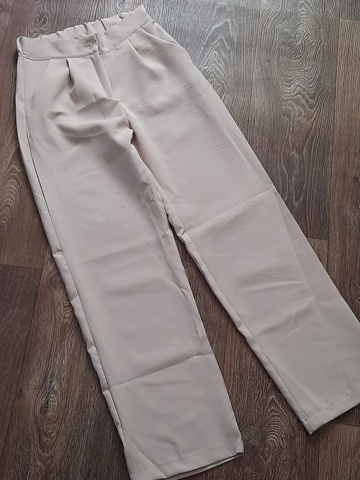 Брюки бежеві НОВІ