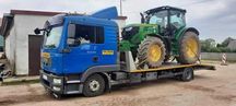 Transport maszyn rolniczych budowlanych ciągników kombajnów Laweta