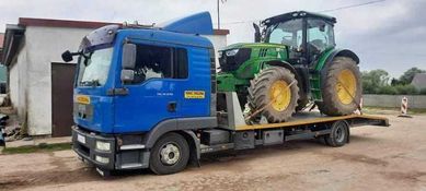 Transport maszyn rolniczych budowlanych ciągników kombajnów Laweta