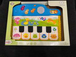 Piano musical de bebé em pano