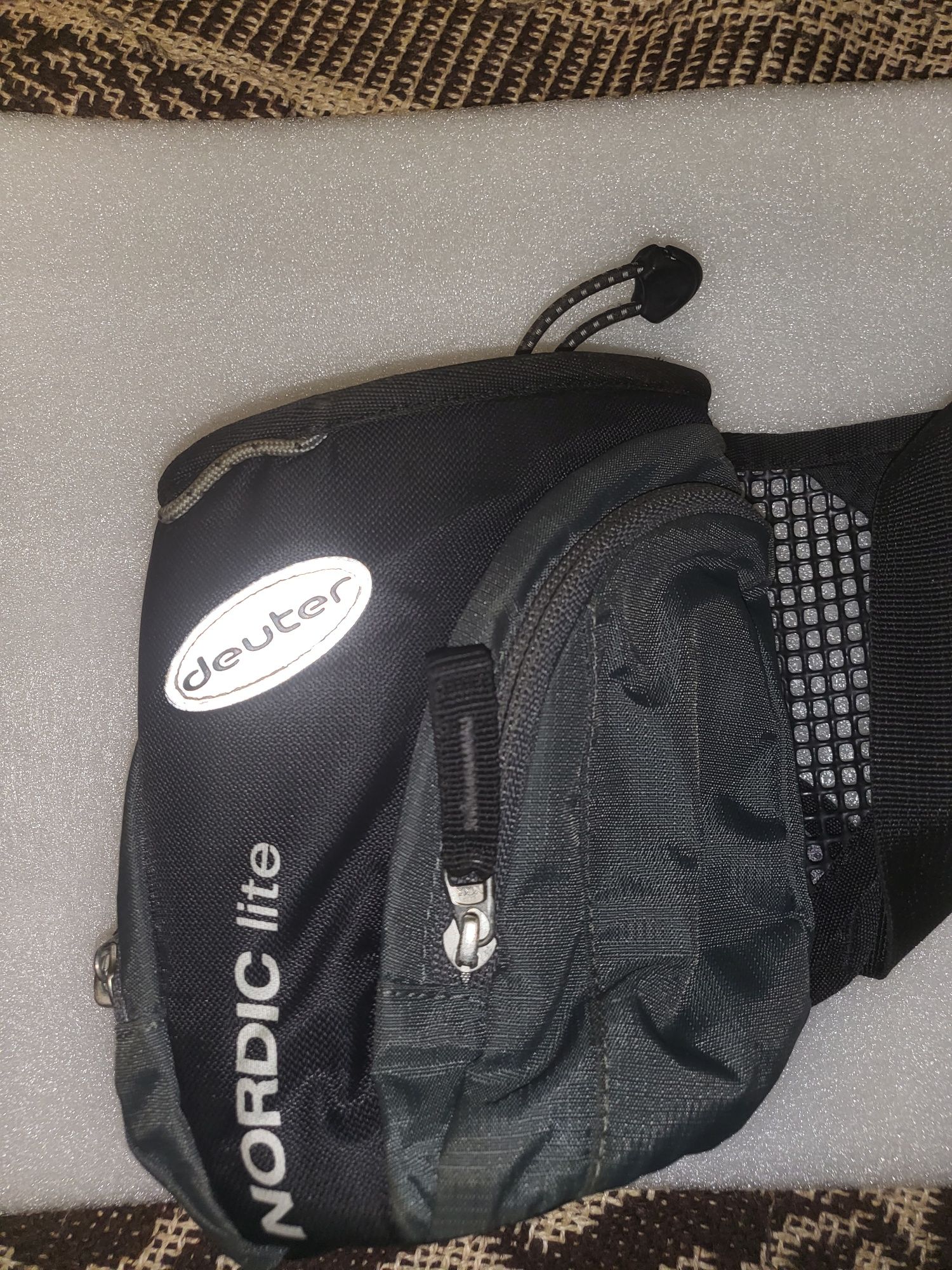 Szaszetki sportowe Reebok i Deuter