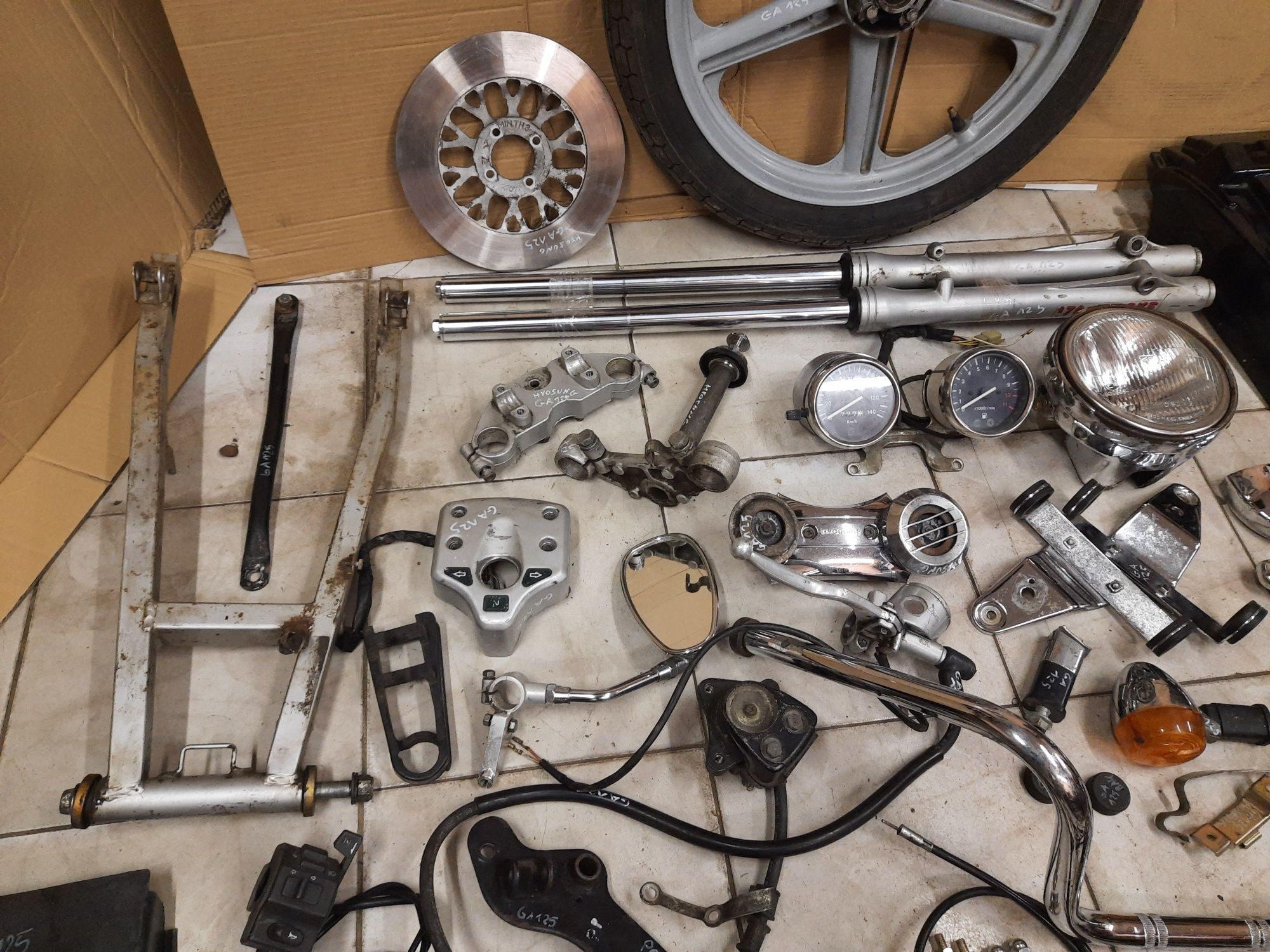 Hyosung GA 125 części cruise 1 koło oś lagi napęd licznik wiązka linki