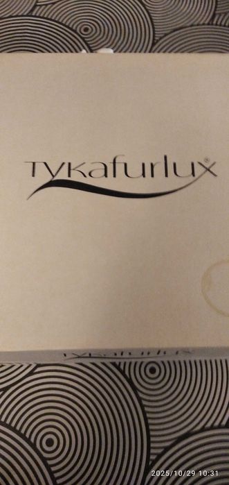 Зимняя кепка  из нерпы черной  компании  tykafurlux модель Стивен 60 р