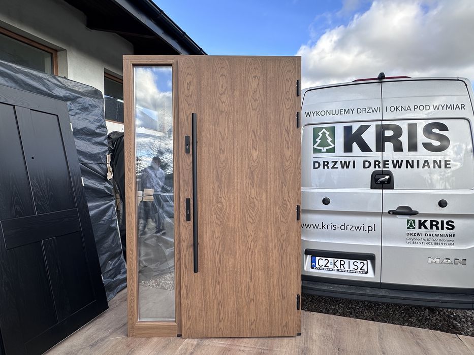 Drzwi zewnętrzne drewniane dębowe z doświetlem i antabą montaz Polska