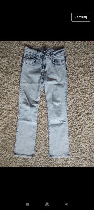 Spodnie długie dla dziewczynki rozmiar 152 cm marka C&A