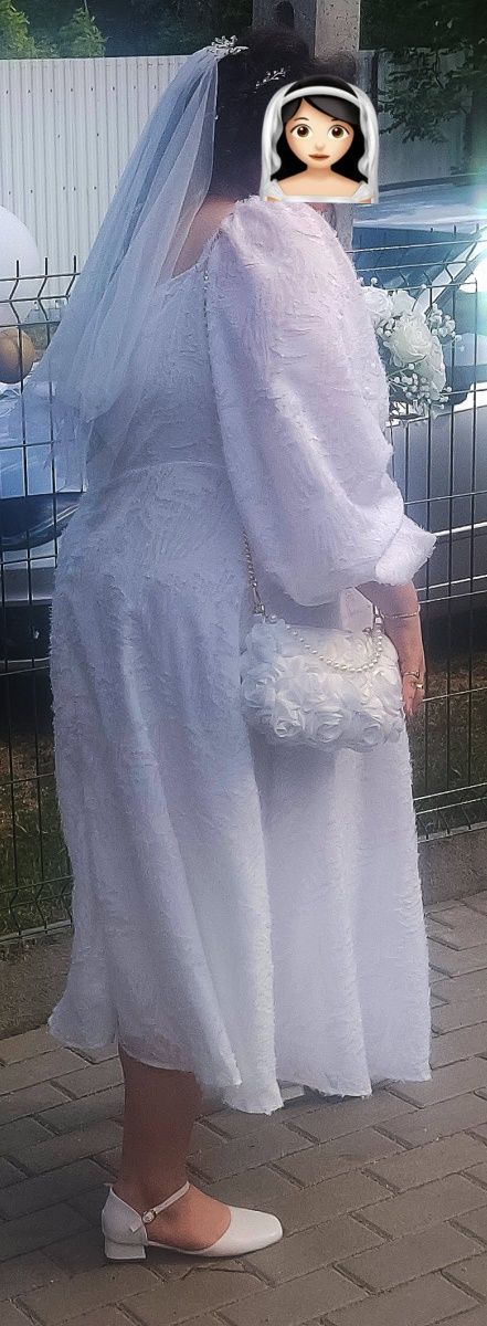 Suknia ślubna plus size w stylu boho rozmiar 50