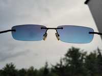 Okulary słoneczne niebieskie bez oprawki z metalowymi uchwytami