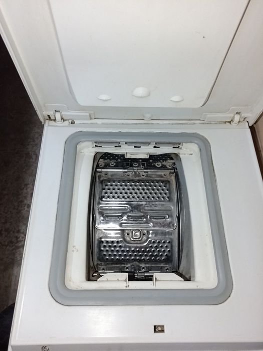 Пральна машинка вертикального завантаження