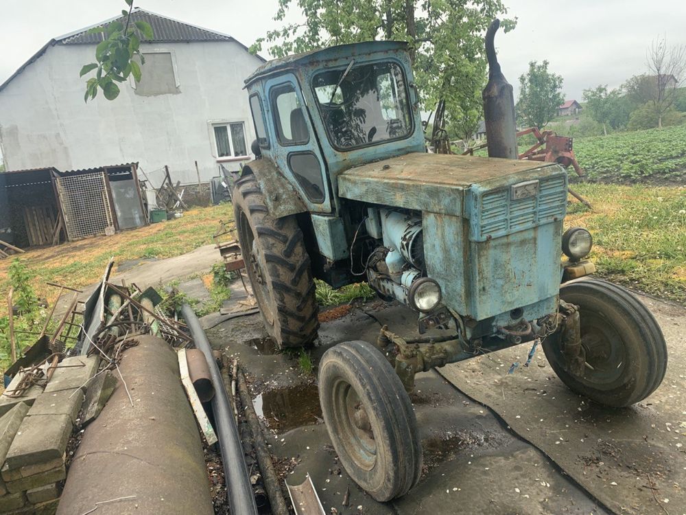 Трактор Т-40, причіп, плуг, культиватор, копалка.