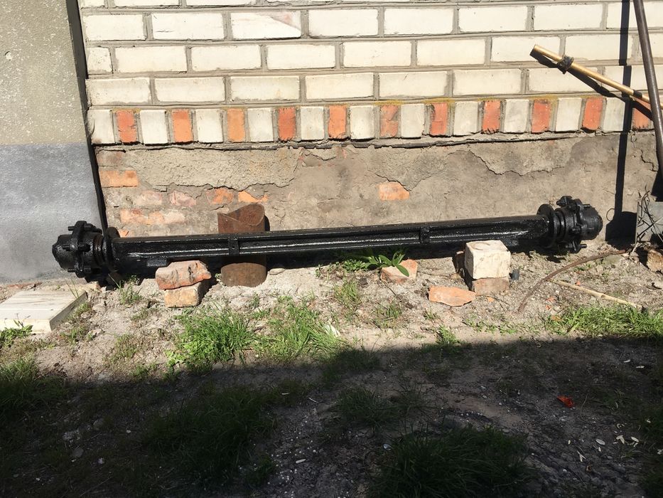 Балка з ступецями для прицепа