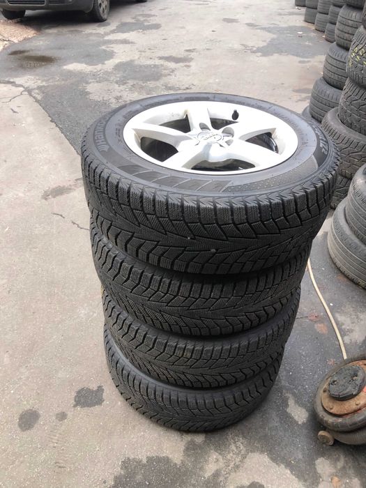 Диски комплект AUDI  A4 2012 року з шинами R16