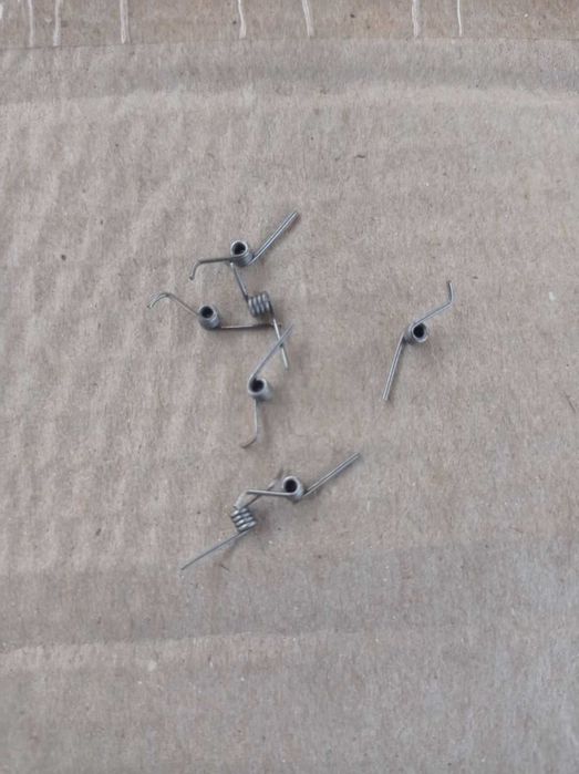 Пружина кручения  для зажима