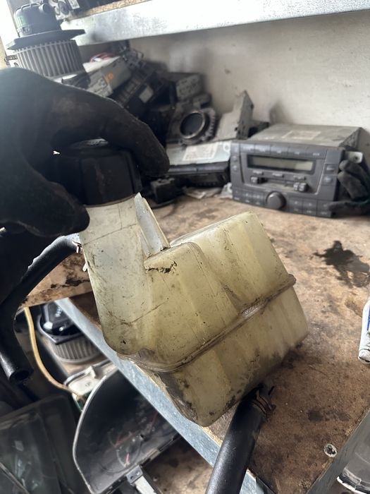 Бачек розширительный омывателя дача супер нова рено логан кенго