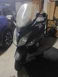 SYM 125 GTS i mota de garagem